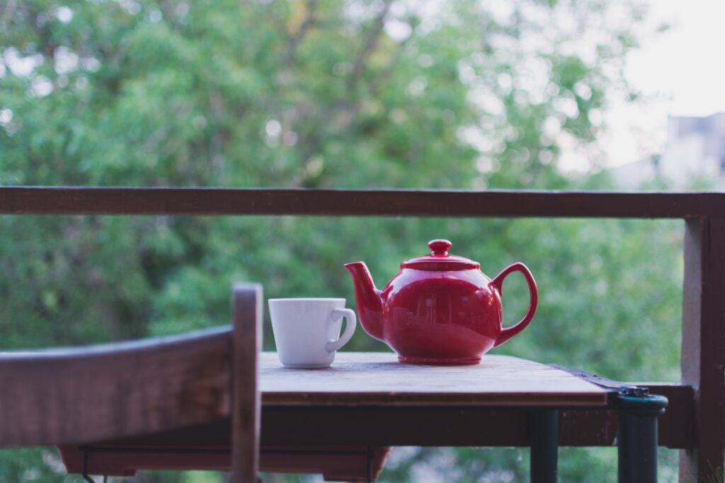Tea pot and mug on a table