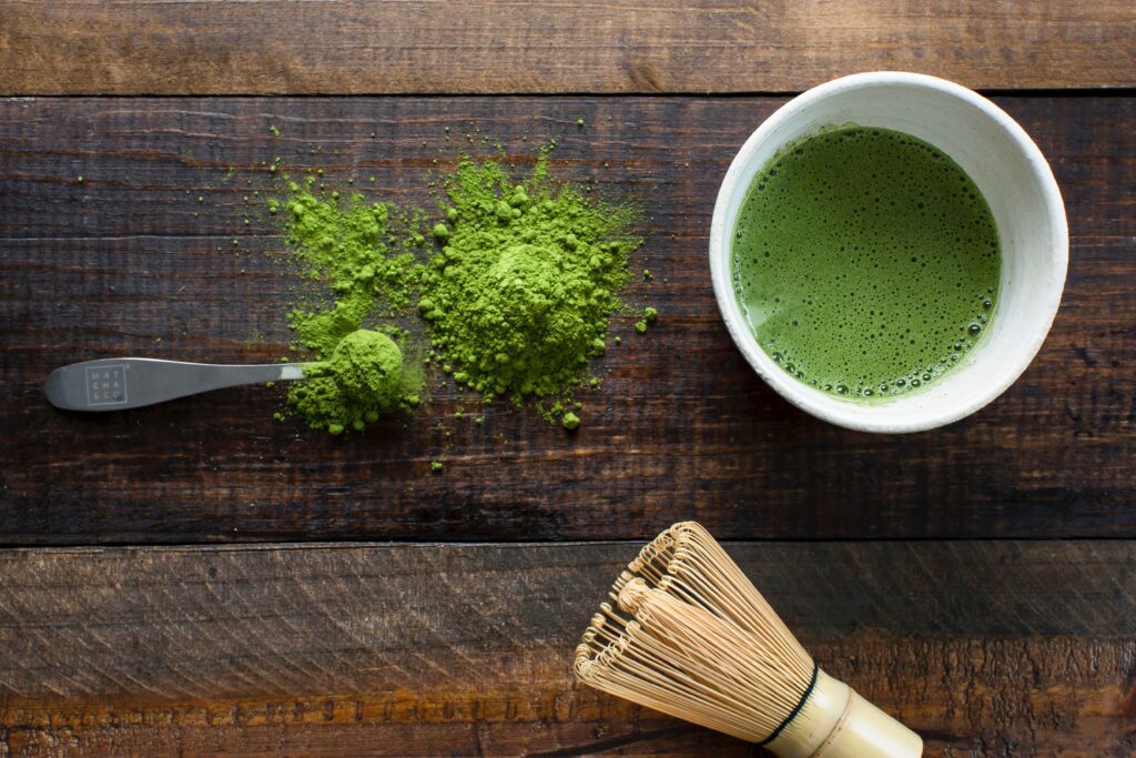 Green tea on a dark wooden background