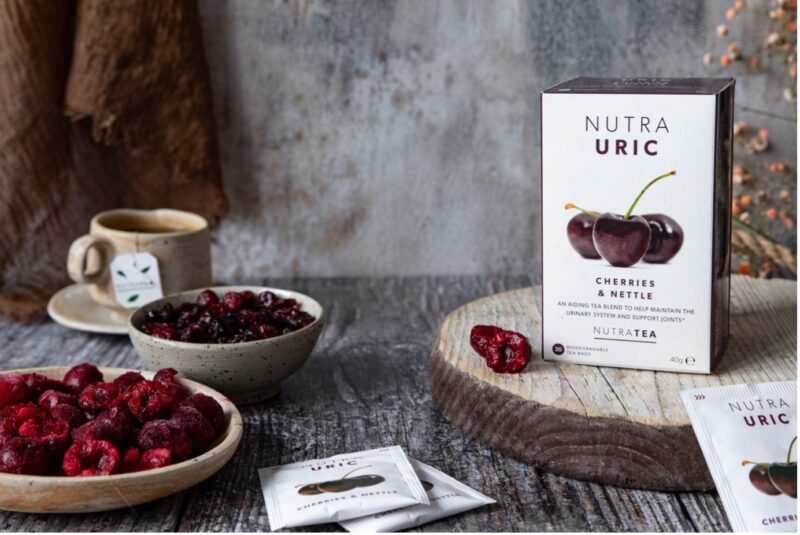 A box of NutraTea NutraUric cherries and nettle tea bags